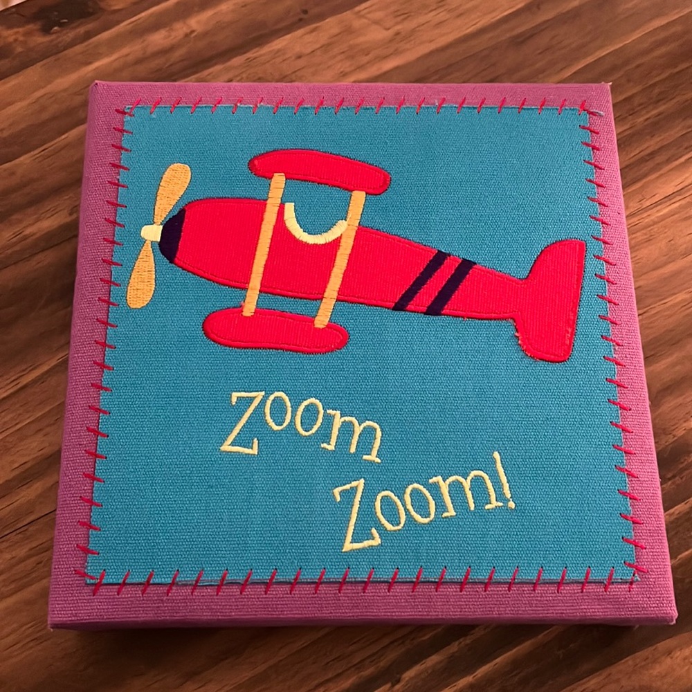Zoom Zoom airplane sign for baby or child’s room. Good condition. 9x9 inches.